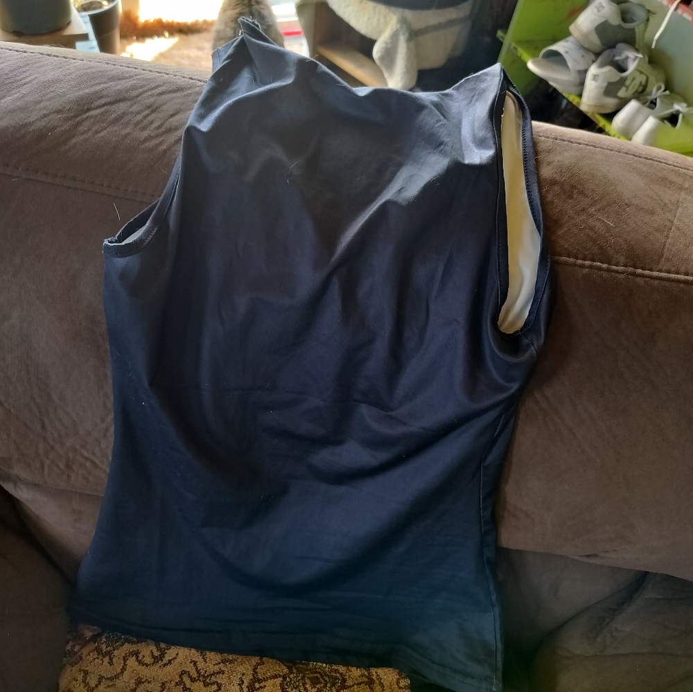 Never been worn.... My chest is too big......